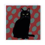 Greeting Card Pure-black cat on a beautiful burgundy and green background