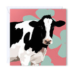 Greeting Card Blacks and white cow standing with its sticky out ears