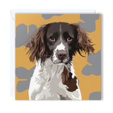 Greeting Card Springer spaniel in front of a grey and yellow background 